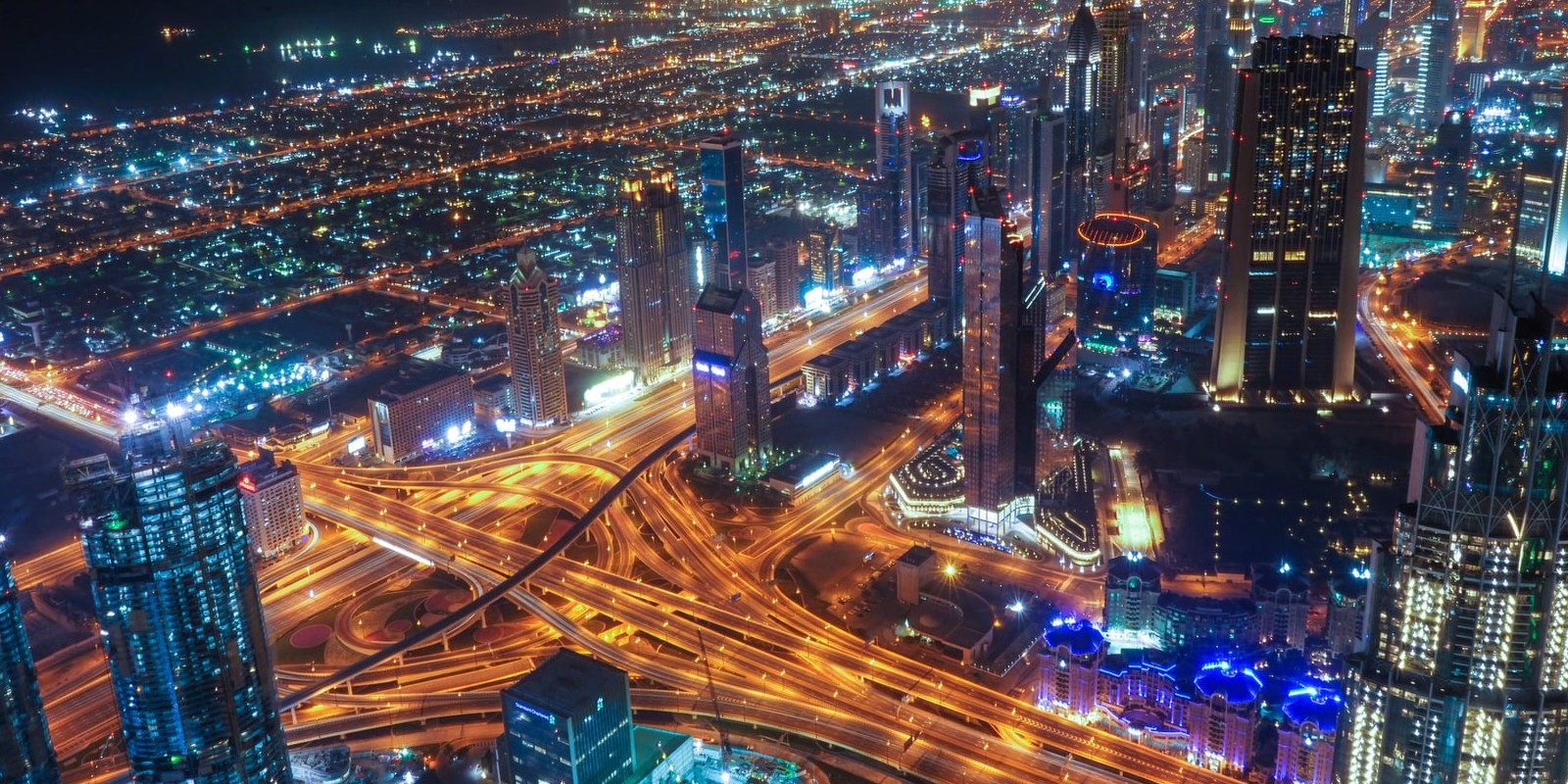 UAE, Dubai skyline by night