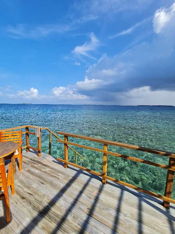View from the balcony of a Water Villa at at Furaveri Island Resort & Spa