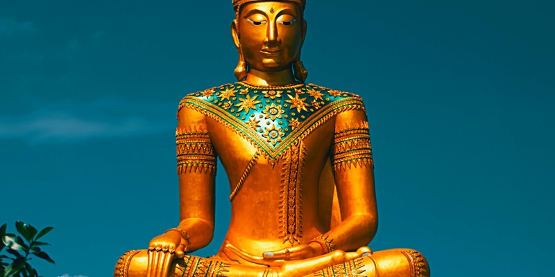 Shiny gold Buddhist statue in Phuket