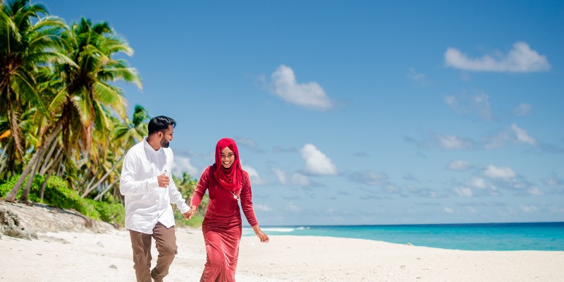 Couple on the beach in the Maldives