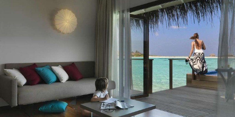 A family relax at Cocoon in the Maldives