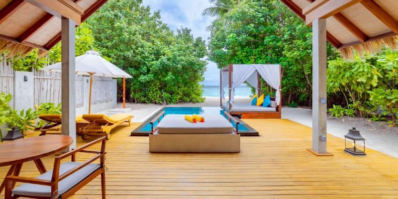 Private pool and garden leading out on to the beach from your villa