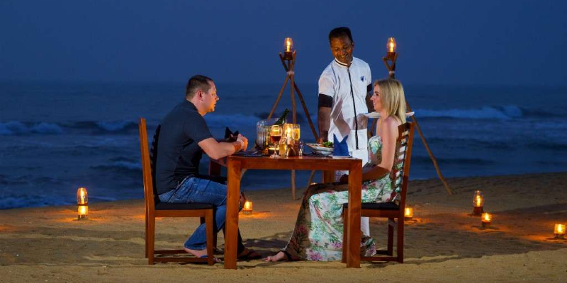 A romantic dinner for two on the beach
