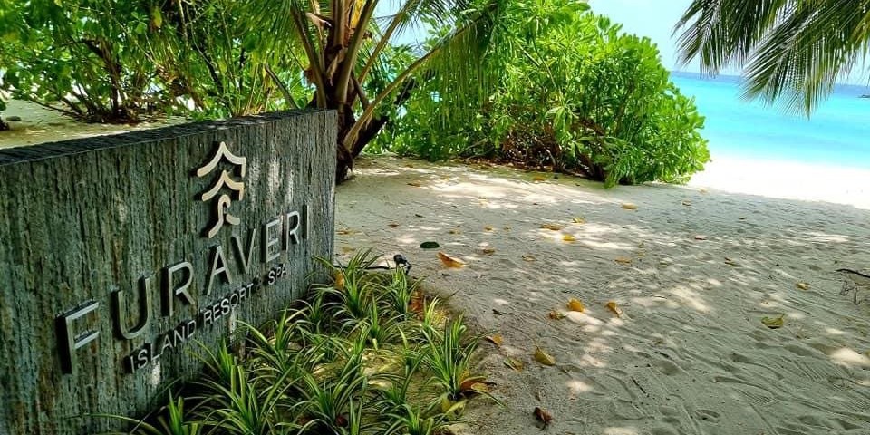 Sign for the Furaveri Island Resort & Spa