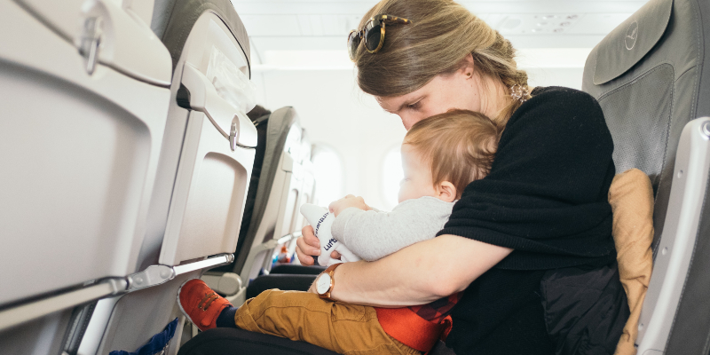 Prepare for a long-haul flight with your baby. Photo credit: @plhnk, Unsplash