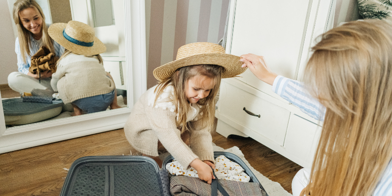 Involve your child with the packing. Photo credit: Ivan Samkov, Pexels