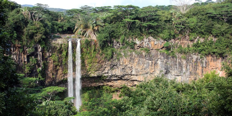 Waterfall running out of a lush national park in Mauritius
