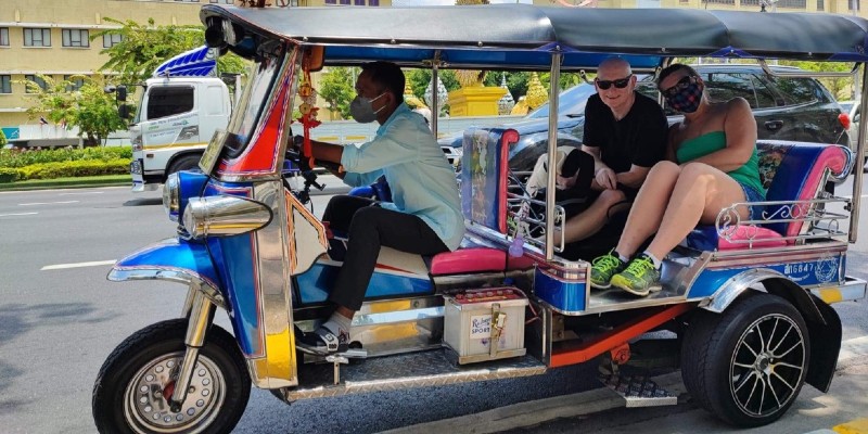 Sharon riding a tuk tuk