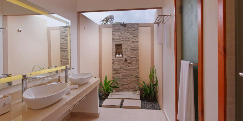 Open-air rain shower in bathroom suite