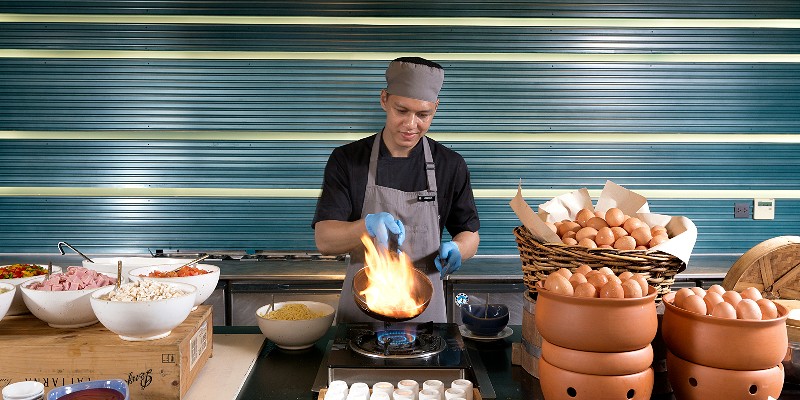 Chef cooking Thai cuisine