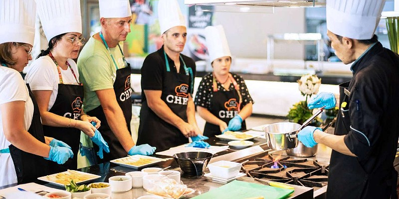 Chefs leading a Thai cooking class at X10 Khao Lak