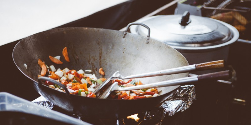 Cooking vegetables in a wok