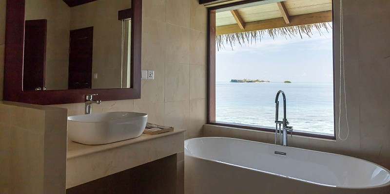 View from the bathtub in a water villa in the Maldives