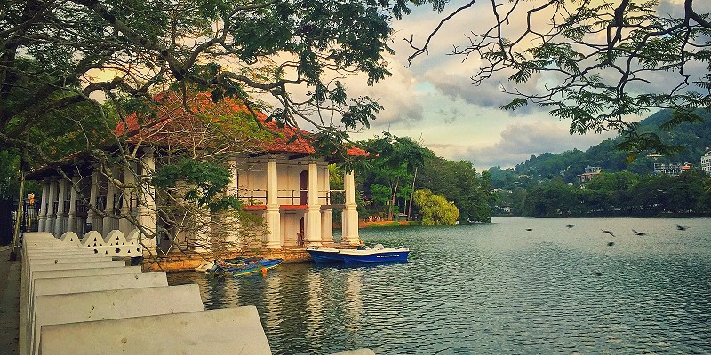 Boats bobbing in the lake water in Kandy