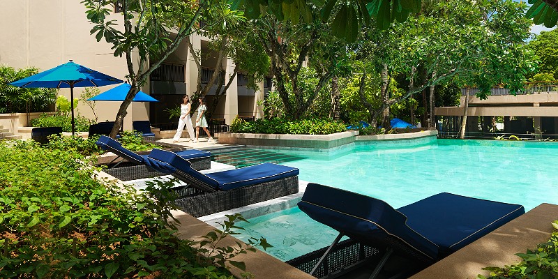 Sun loungers around one of the 3 resort pools